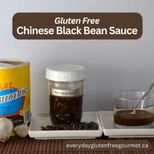 A jar of homemade gluten free Chinese Black Bean Sauce beside the original container of preserved beans.