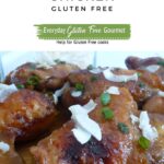 Chicken thighs covered in mango chutney sauce sprinkled with coconut and green onion.