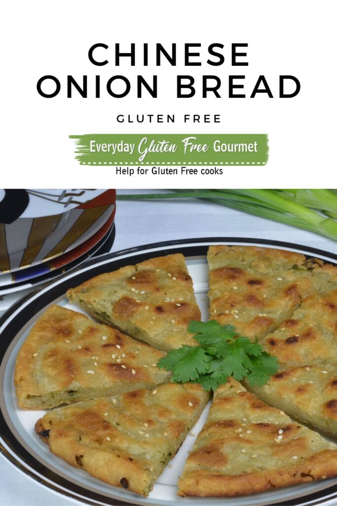 A plate of gluten free Chinese Onion Bread cut into wedges and garnished with cilantro.