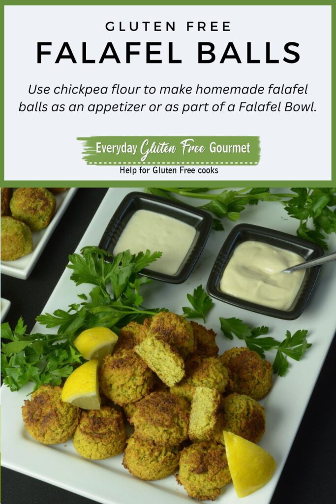 A platter of gluten free Falafel Balls with bowls of Tahini Sauce, garnished with fresh parsley and lemon wedges.