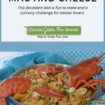 A dish of gluten free Lobster Mac and Cheese with the head and tail of the lobster used as a garnish.