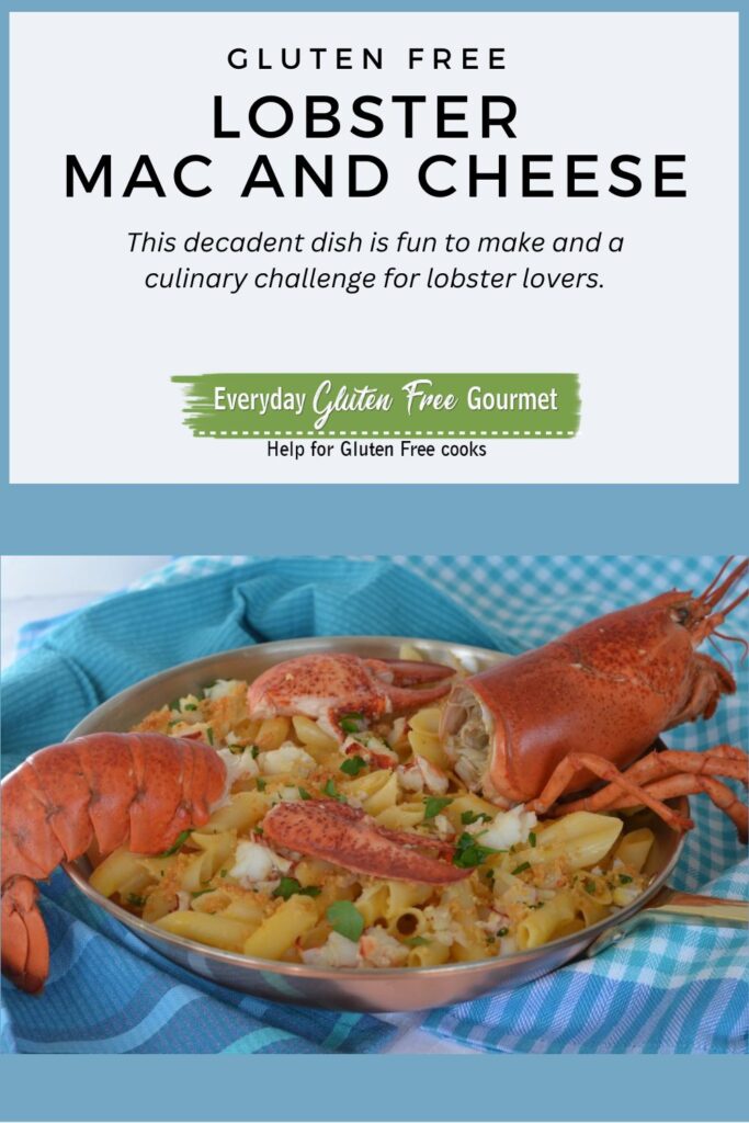 A dish of gluten free Lobster Mac and Cheese with the head and tail of the lobster used as a garnish.