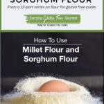 An egg just dropped into a pile of millet flour.