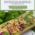 A plate with Vietnamese Cabbage Chicken Salad garnished with peanuts, mint, cilantro and fresh lime.