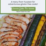 Slices of grilled Achiote Chicken on a bed of rice beside grilled summer squash and red onion.