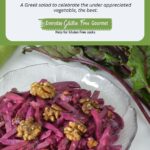 A bowl of Beet Salad with yogurt dressing and topped with walnuts.