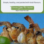 A plate of Grilled Tandoori Shrimp with fresh lime wedges.