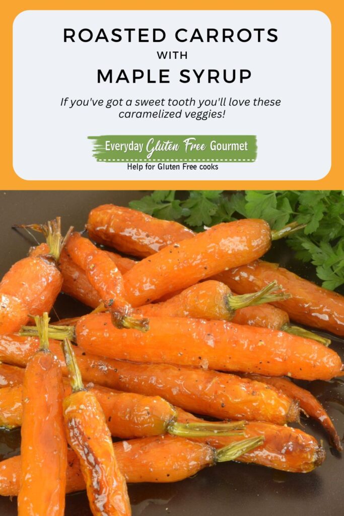 A plate with whole roasted carrots with a maple glaze.