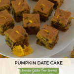 Cut pieces of Pumpkin Date Cake on a pedestal tray garnished with edible flowers and surrounded my mini pumpkins.