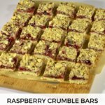 A board with cut gluten free Raspberry Crumble Bars.