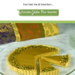 A gluten free Bourbon Caramel Pumpkin Tart on a platter with two pieces cut.