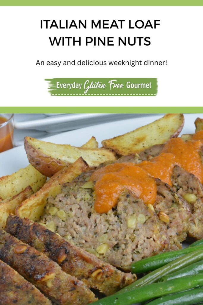 Slices of Italian Meat Loaf with Pine Nuts served with fresh tomato sauce, green beans and roasted potatoes.