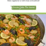 A paella pan filled with Paella with Seafood