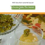 A dish of Homemade Pumpkin Ice Cream with Bourbon Caramel Sauce topped with sweet and salty roasted pumpkin seeds.