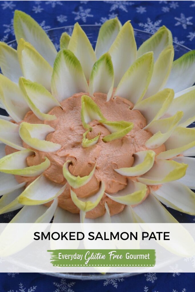 A platter with smoked salmon pate surrounded by Belgain endive leaves to look like a flower.