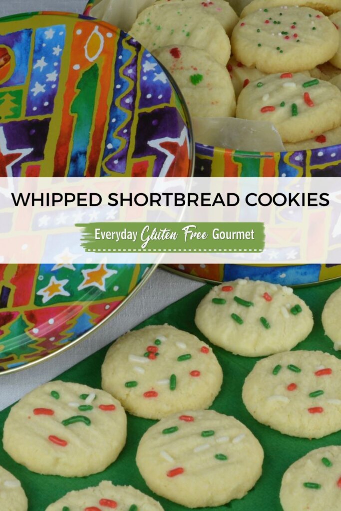 A tin of gluten free Whipped Shortbread cookies decorated with red and green sprinkles.