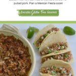 A platter of Mexican Pork Carnitas surrounded by tacos filled with the pork.